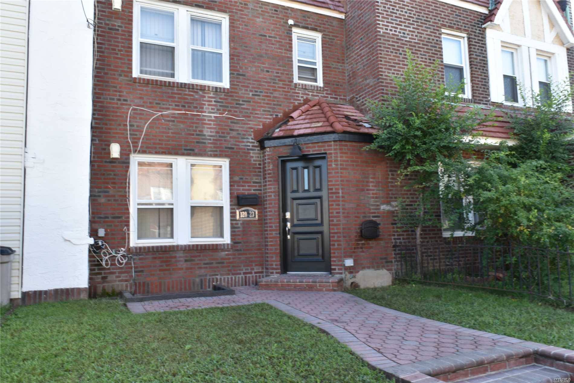 Meticulously Maintained Attached Brick Colonial Feat.