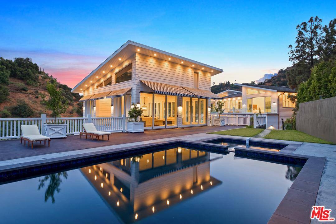 Situated atop a private street in lower Bel Air & designed to unite both traditional & contemporary
