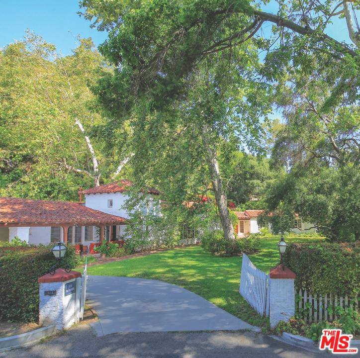 Romantic Spanish Revival Estate in Prime Lower Bel-Air located one block away from the famed Hotel Bel-Air