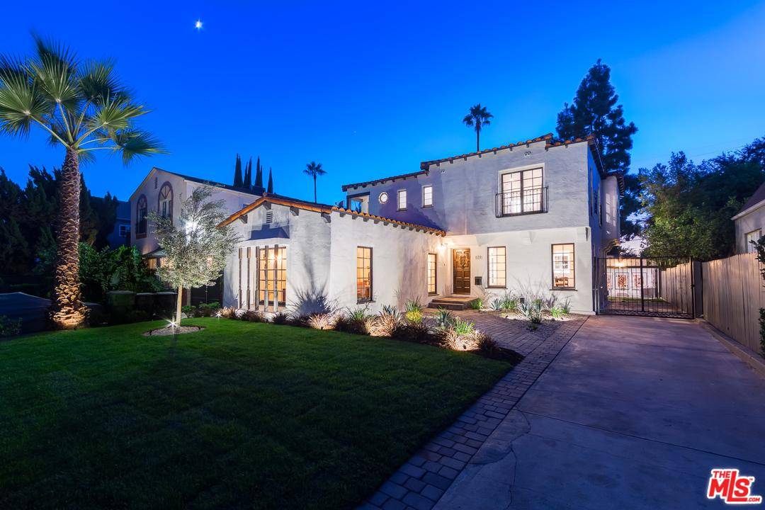 Timeless Spanish Colonial Revival remodeled with chic contemporary flair