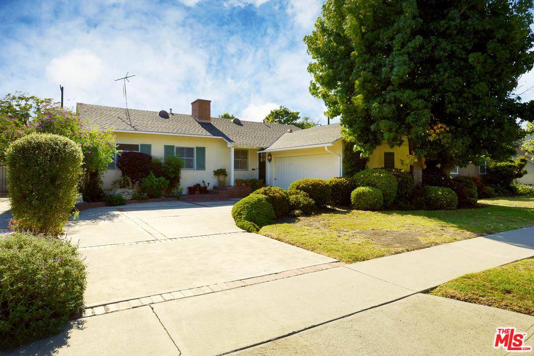 This Westdale Trousdale home sits on a quiet wide street and offers 3 bedrooms and 3 baths
