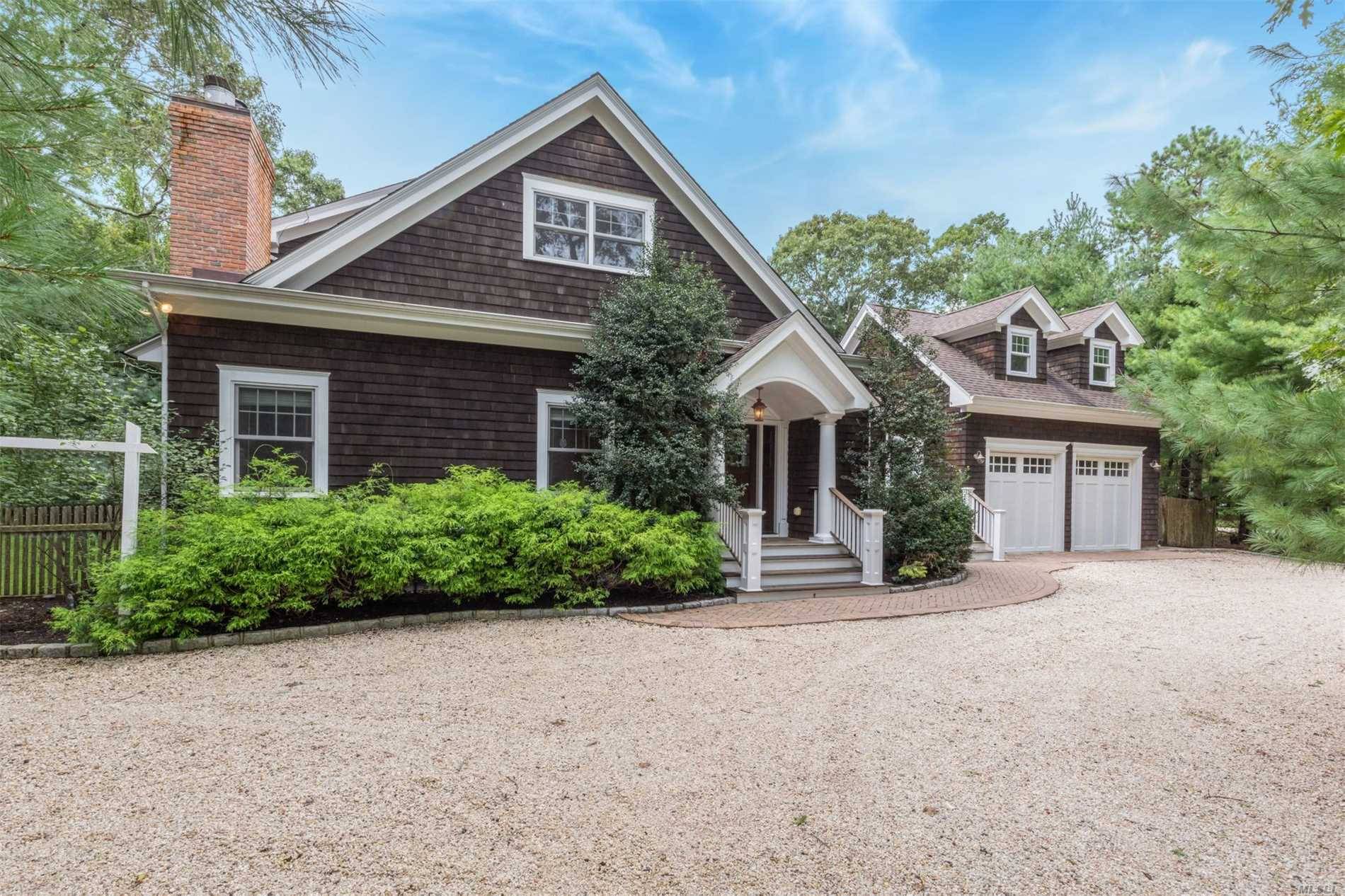 TURN KEY QUOGUE BEACH FARMHOUSE with Immaculate Attention To Detail, Expansive Entertaining Spaces And Flawless Design Characteristics.
