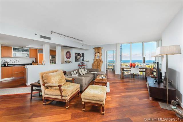 Enjoy luxury living at Murano Grande w/ panoramic ocean views from the lower penthouse