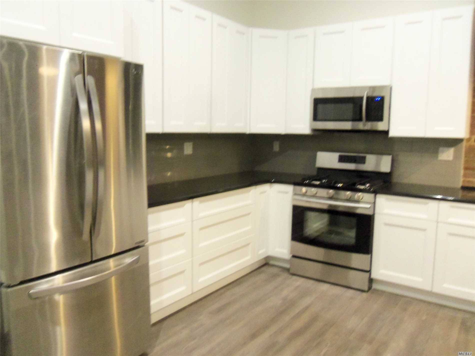 All New Luxury One Bedroom Apartment On Top Floor Of Newly Renovated Elevator Building On Sunrise Highway Across The Street From The Lirr Station.