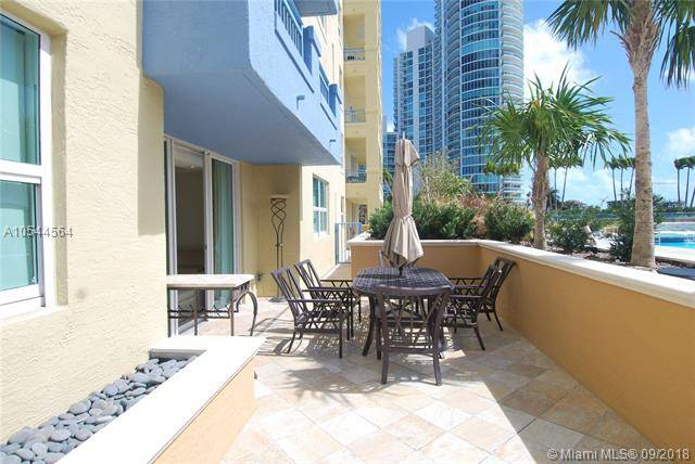 Awesome lanai unit with beautiful terrace at the pool level