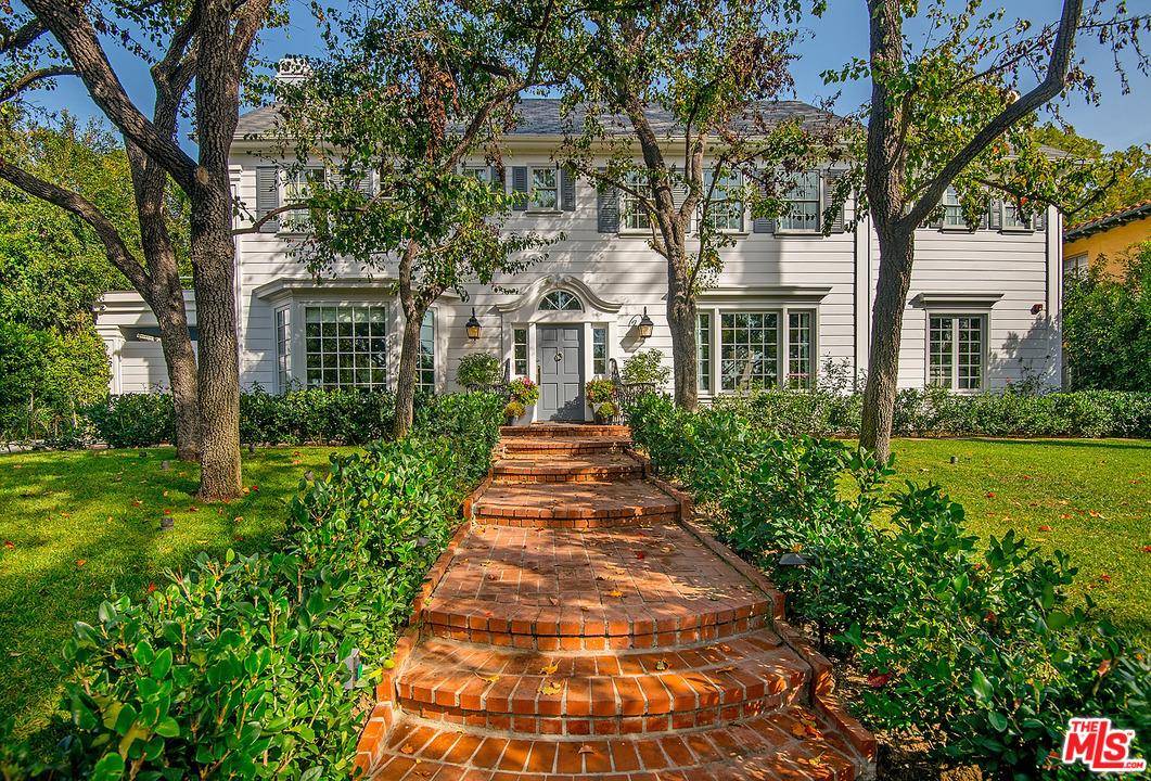 Located on one of the most charming tree-lined streets in the Beverly Hills Flats