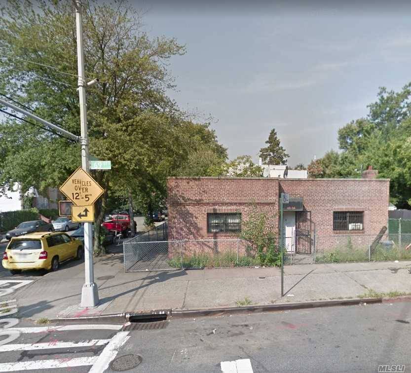 Corner Property With Many Potential One Block From Queens Blv.