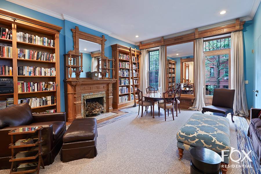 This meticulously restored Harlem townhouse with an income producing garden floor apartment was built in the 1880's and is situated on the most beautiful residential block in Harlem.