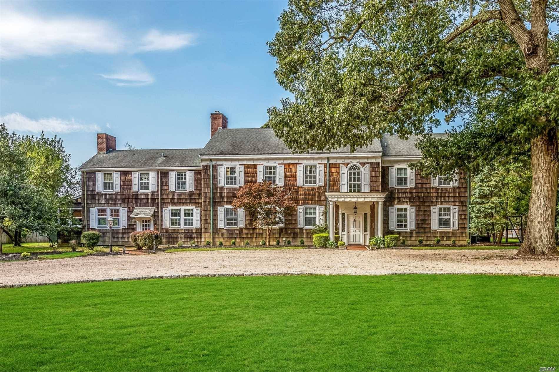 Secluded & Private Comes To Mind As You Enter This Spectacular Georgian Colonial Nestled On 3.