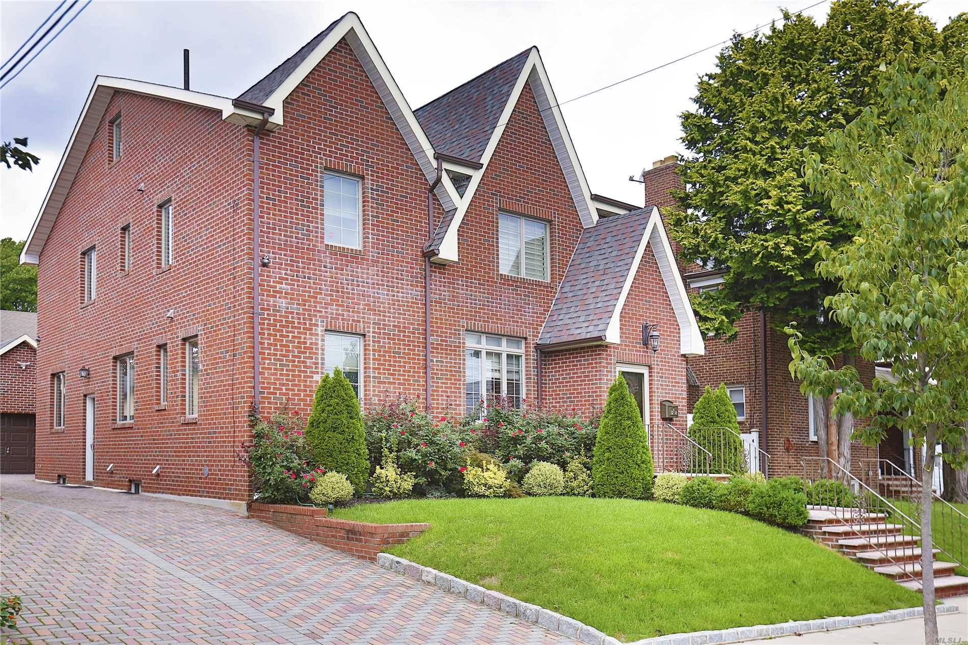 Rare Find- Elegant, Luxurious And Bright Custom Built 5 Bedroom Tudor With All Brick In The Heart Of Flushing, Mins To Lirr.