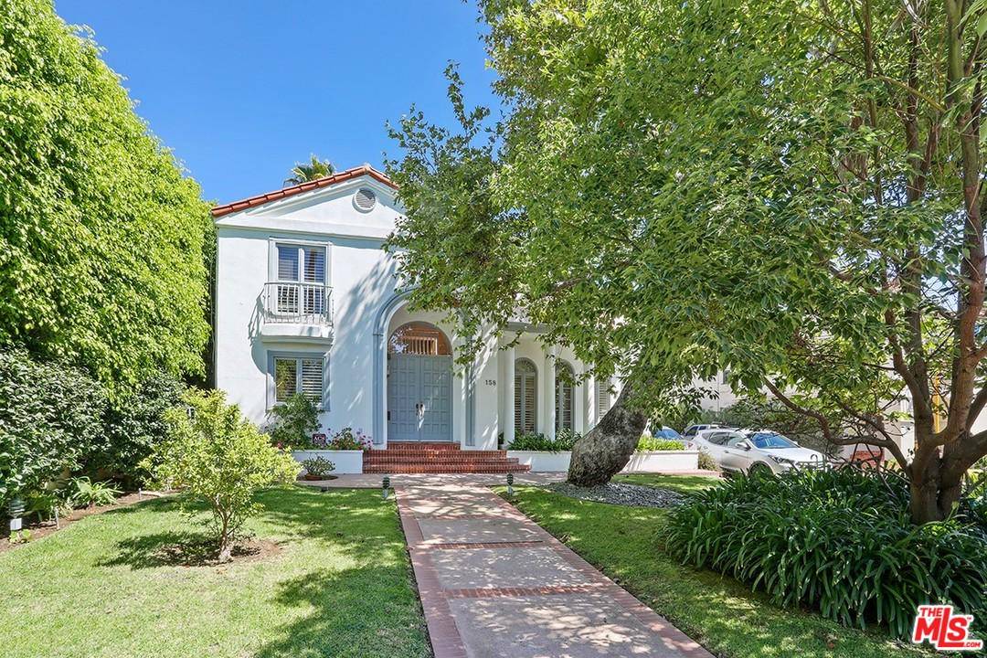 Custom built 2-story 5 bedroom home in coveted Brentwood neighborhood South of Sunset