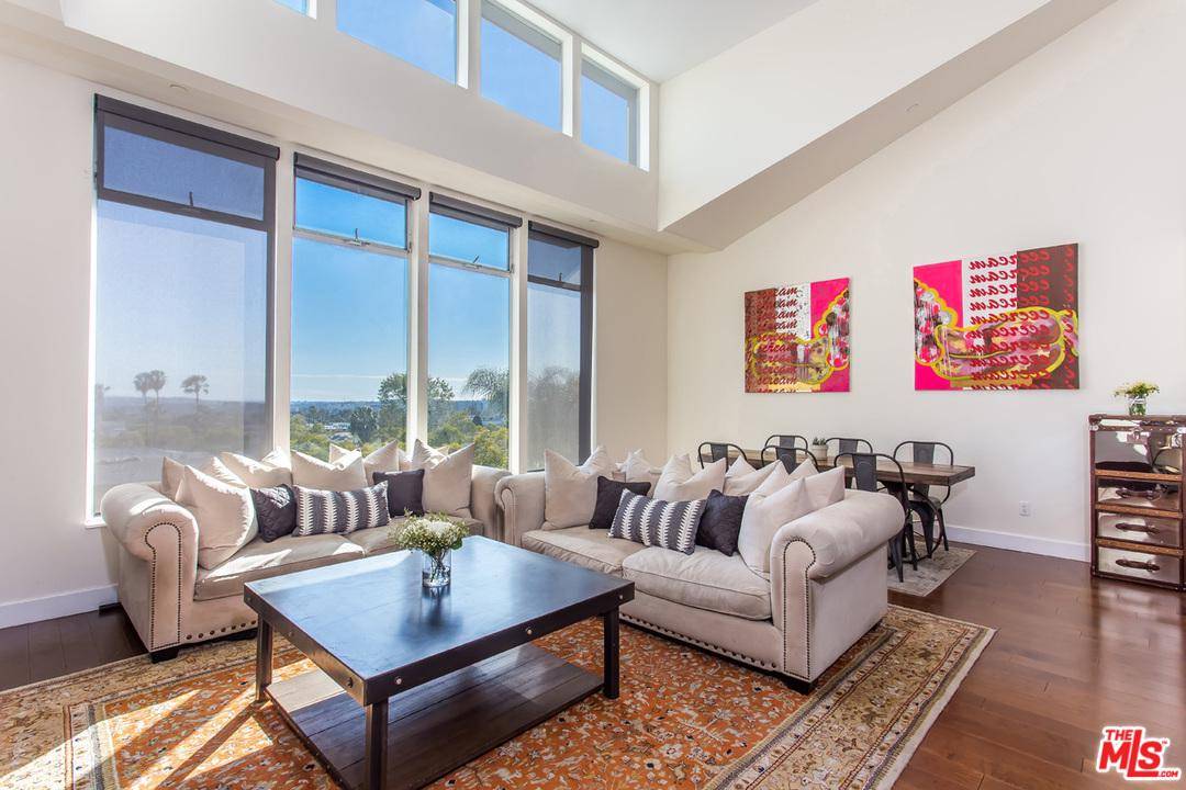 Stunning 2-story architectural penthouse located on a quiet tree-lined street in prime West Hollywood