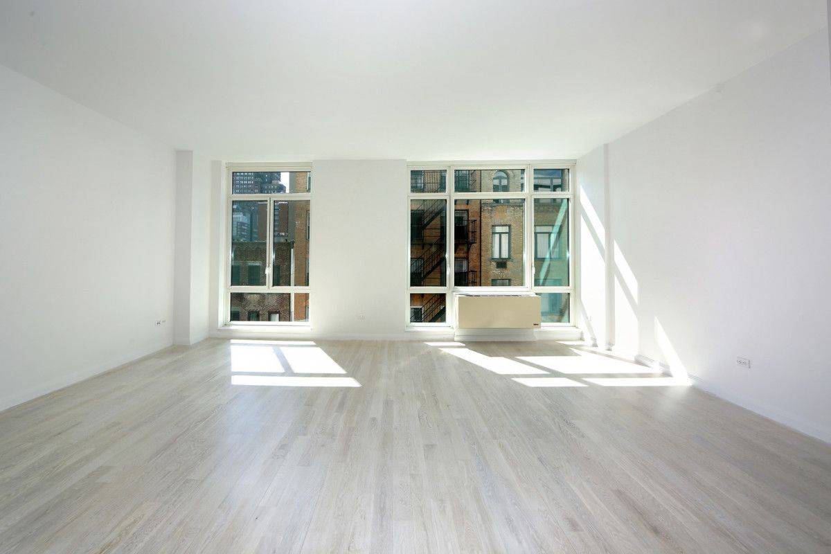 1 bed/1.5 bath in Luxury Boutique building in Soho. washer/dryer in unit!