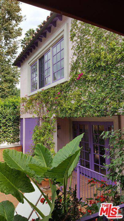 This Gorgeous 2 story Spanish-style guesthouse is in the flats of Beverly Hills and just 2 blocks from Rodeo Dr