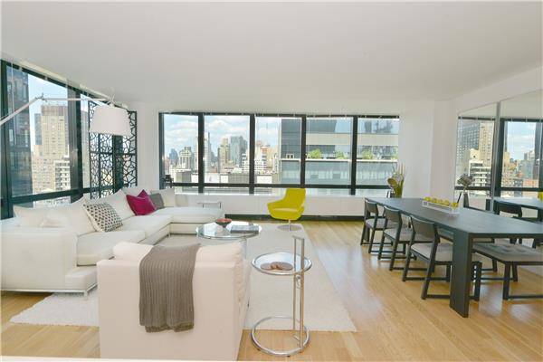 Massive 3 Bedroom 2 Bath Luxury Renovated Apartment With Floor To Ceiling Windows In Luxury MidTown East High Rise