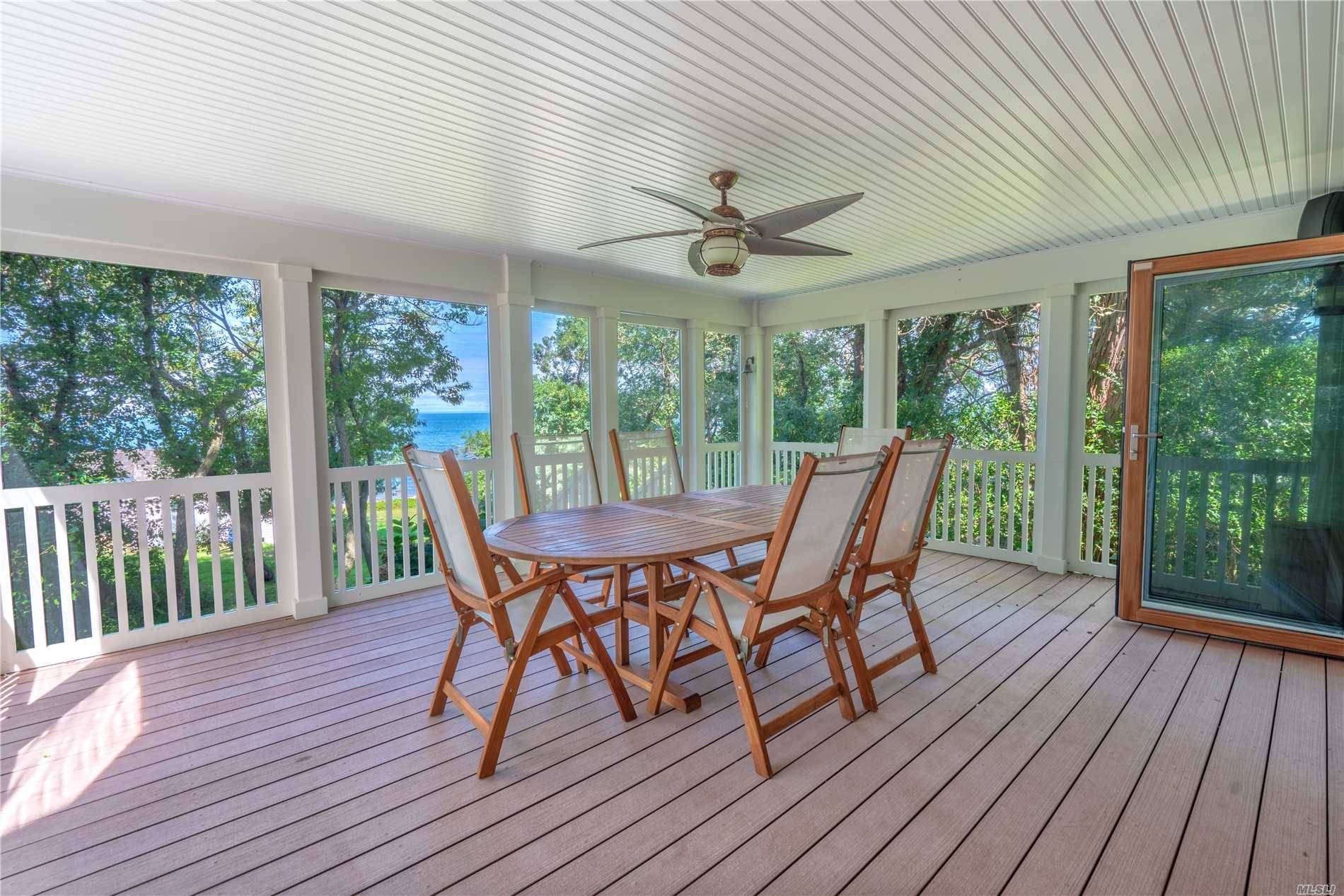This Custom Built Home Offers Scenic Views Of The Long Island Sound Is Steps From A Sandy And Private Deeded Beach.