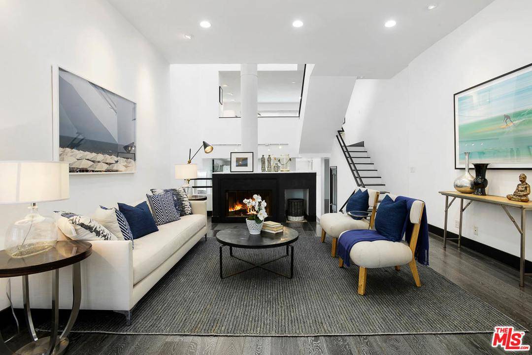 This high-end contemporary townhome provides multiple living and entertaining areas