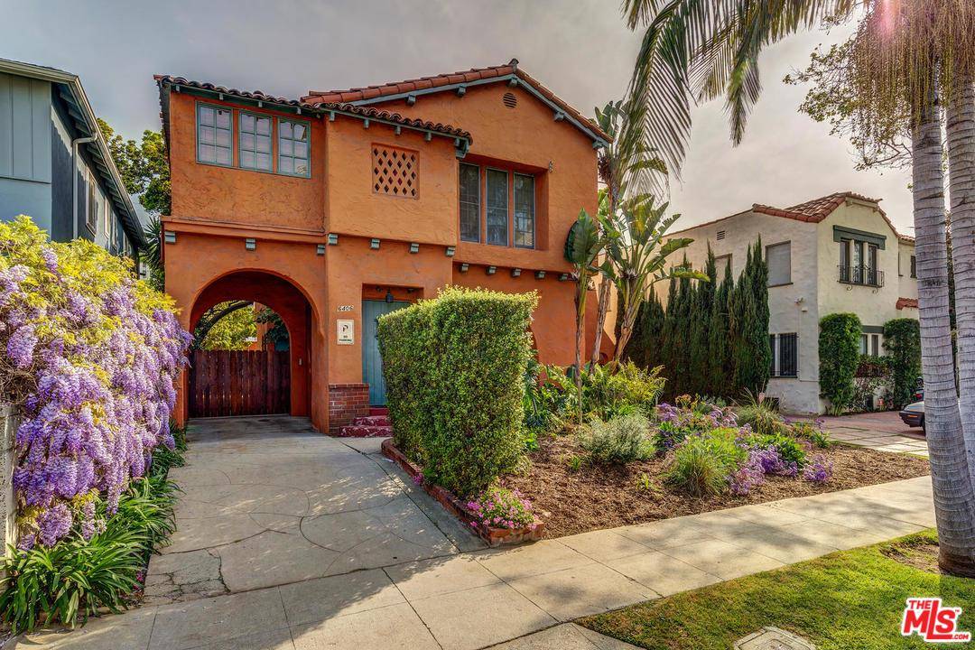 Two-story Spanish duplex located on the most serene portion of 6th Street