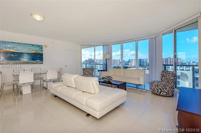 Enjoy sunsets or sunrises from this corner condo by the ocean