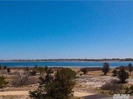 South Of The Highway In Quogue Offering 6 Acres Of Waterfront Peninsula With Endless Views Of Penniman Cove.