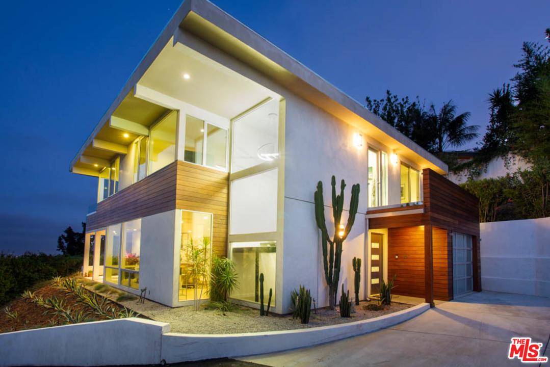 Remodeled modern style home with exceptional privacy and sweeping city lights views