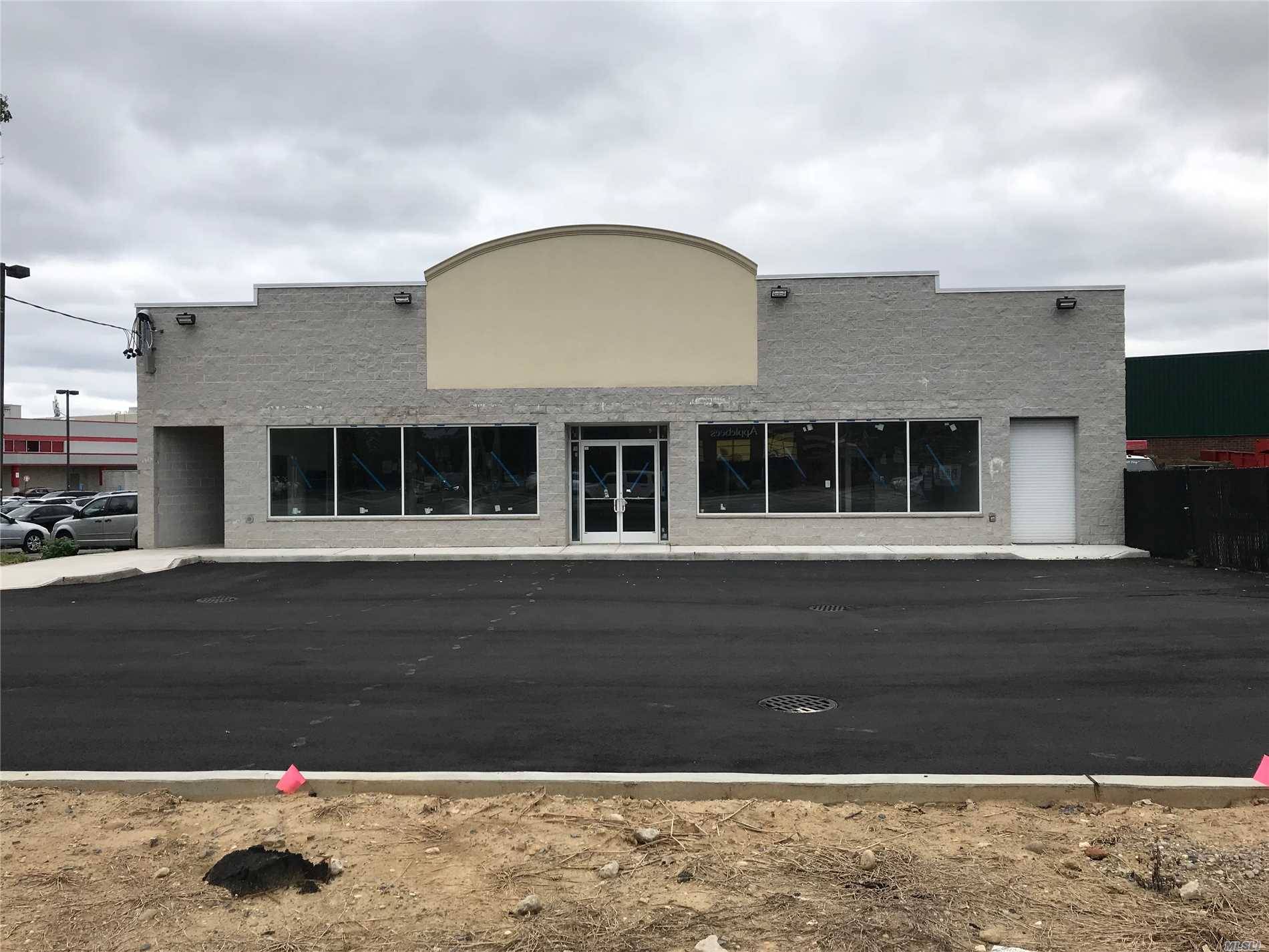 Brand New Retail Building 12-Foot Ceiling, With 3000 Sqft + 2500 Sqft Basement, On The Busy Street And Corner Lot, 9 Parking Spaces With Loading Dock.