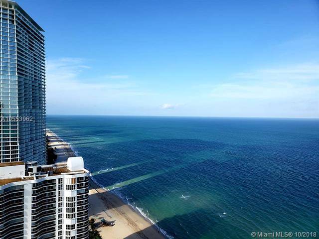 Spectacular views from this ocean front 2 bedrooms + Den unit