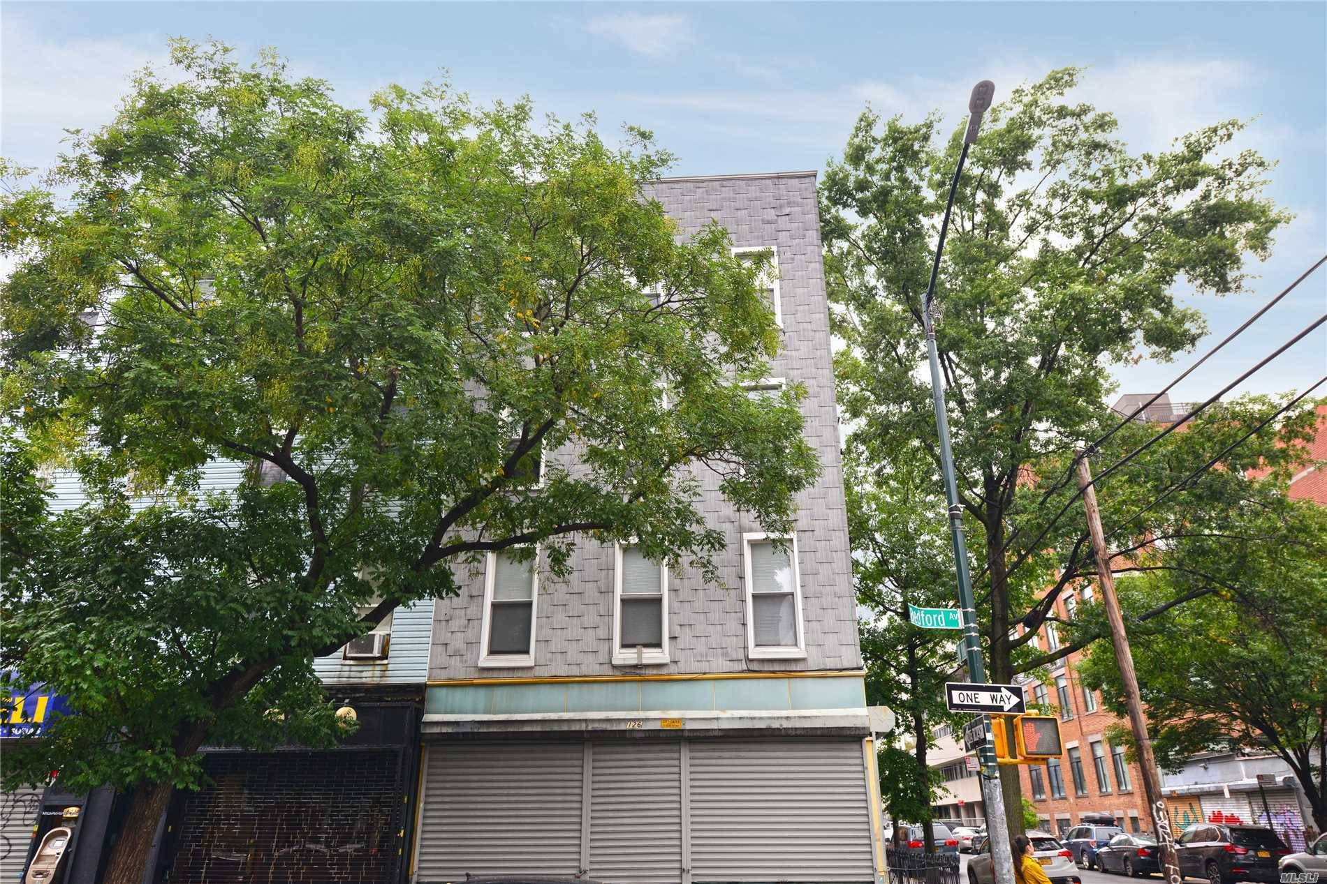 Excellent Income Producing Mixed Use Building With 5 Residential Apartments With Free Market Rent And 1 Ground Level Commercial That Is Owner Occupied.