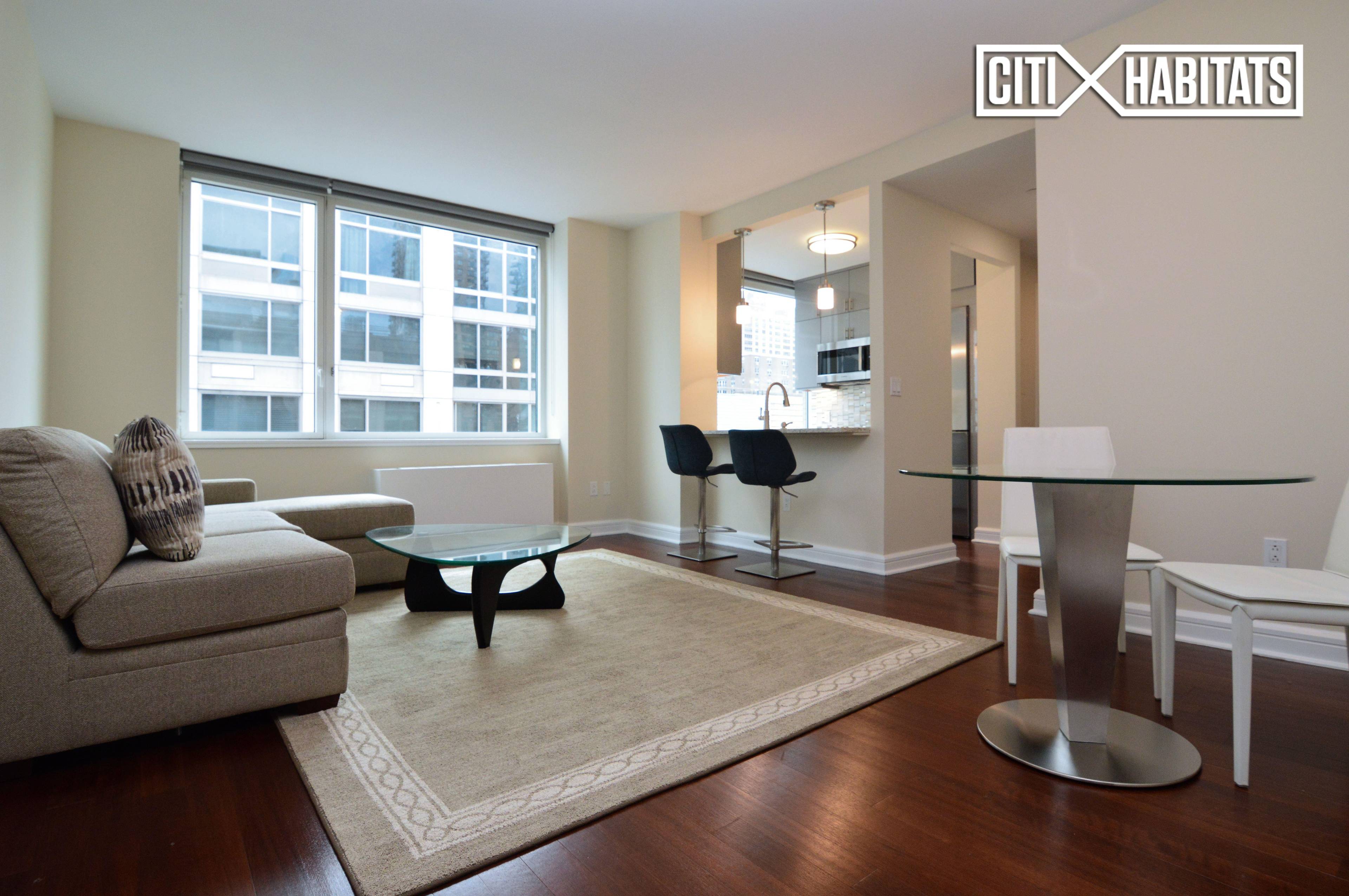 Live in luxury in this nearly 1200 square foot, 2 bedroom 2 bath apartment, with partial Hudson River views, in the Avery Condominium.