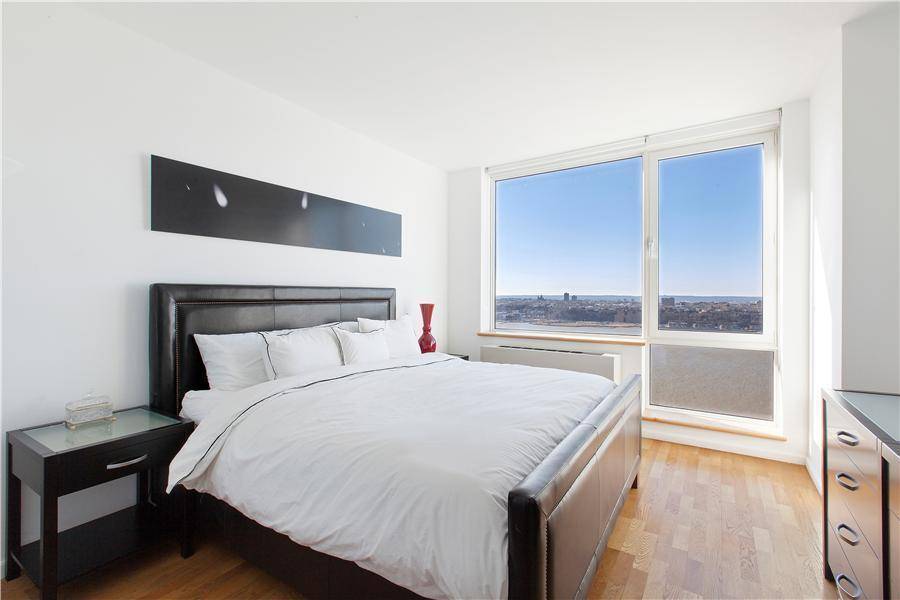 MIDTOWN WEST, HUDSON RIVER, TIME SQUARE, FANTASTIC CITY VIEW *1BED WALLS OF WINDOW *SLEEK*STEPS FROM TIME SQUARE**GREAT INVESTMENT