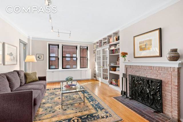 This beautiful, south facing one bedroom plus home office is flooded with light on a prime Upper East Side block.