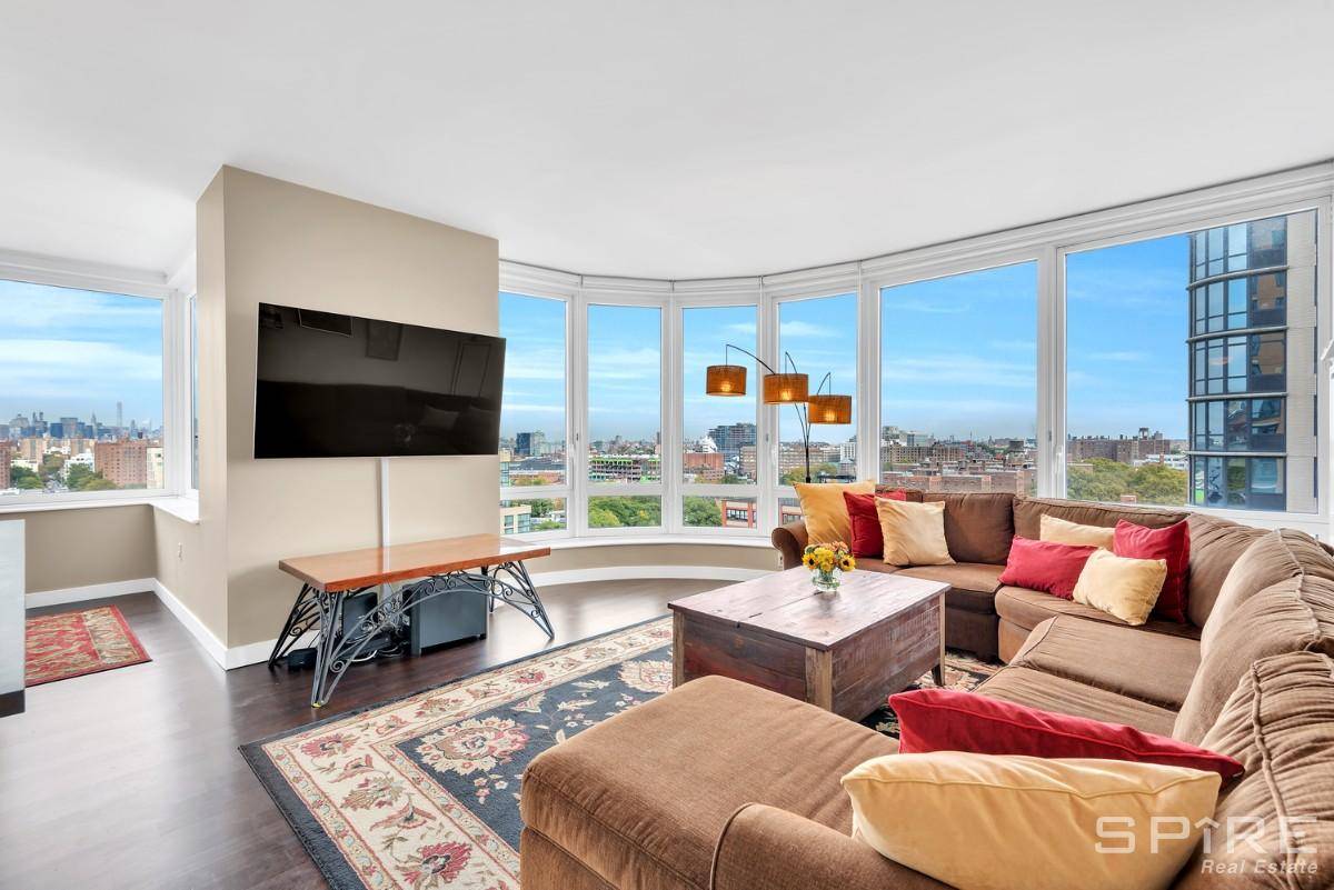 This modern two bedroom residence features panoramic Northeast views of the Manhattan skyline through double paned windows.