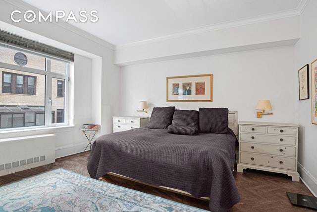 Welcome to apartment 1207, a generous and welcoming studio in one of the most distinguished addresses on Central Park.
