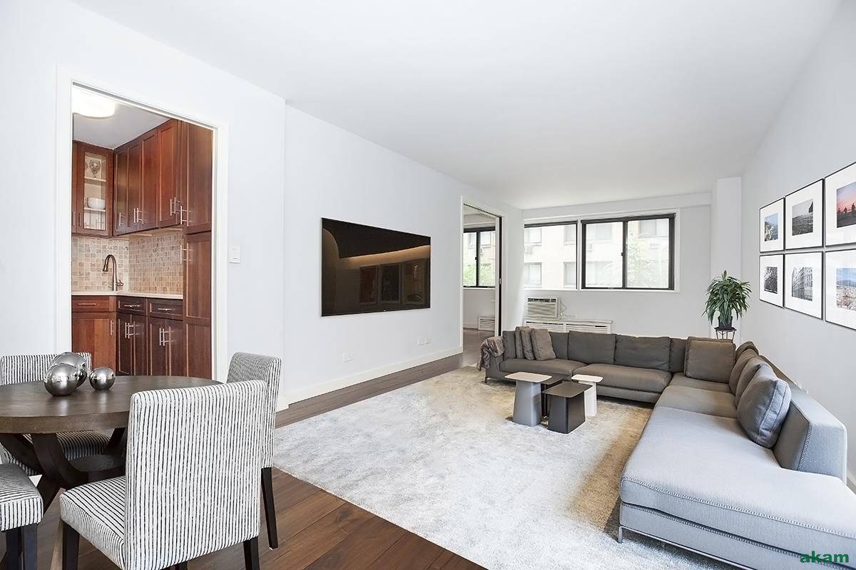 Not your typical TWO BEDROOM TWO BATH, Apartment 3JK S is actually 2 separate units that have been seamlessly combined to create a spacious home with beautiful wide plank walnut ...