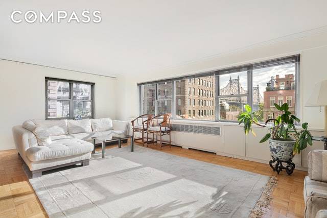 This spacious corner five room, two bedroom, two bath residence features a light filled north and east facing living room of excellent proportions with breathtaking views of the Queensboro Bridge ...