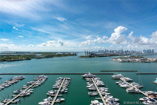 This 2bed/2bath corner unit facing the bay at the Yacht Club is rarely available