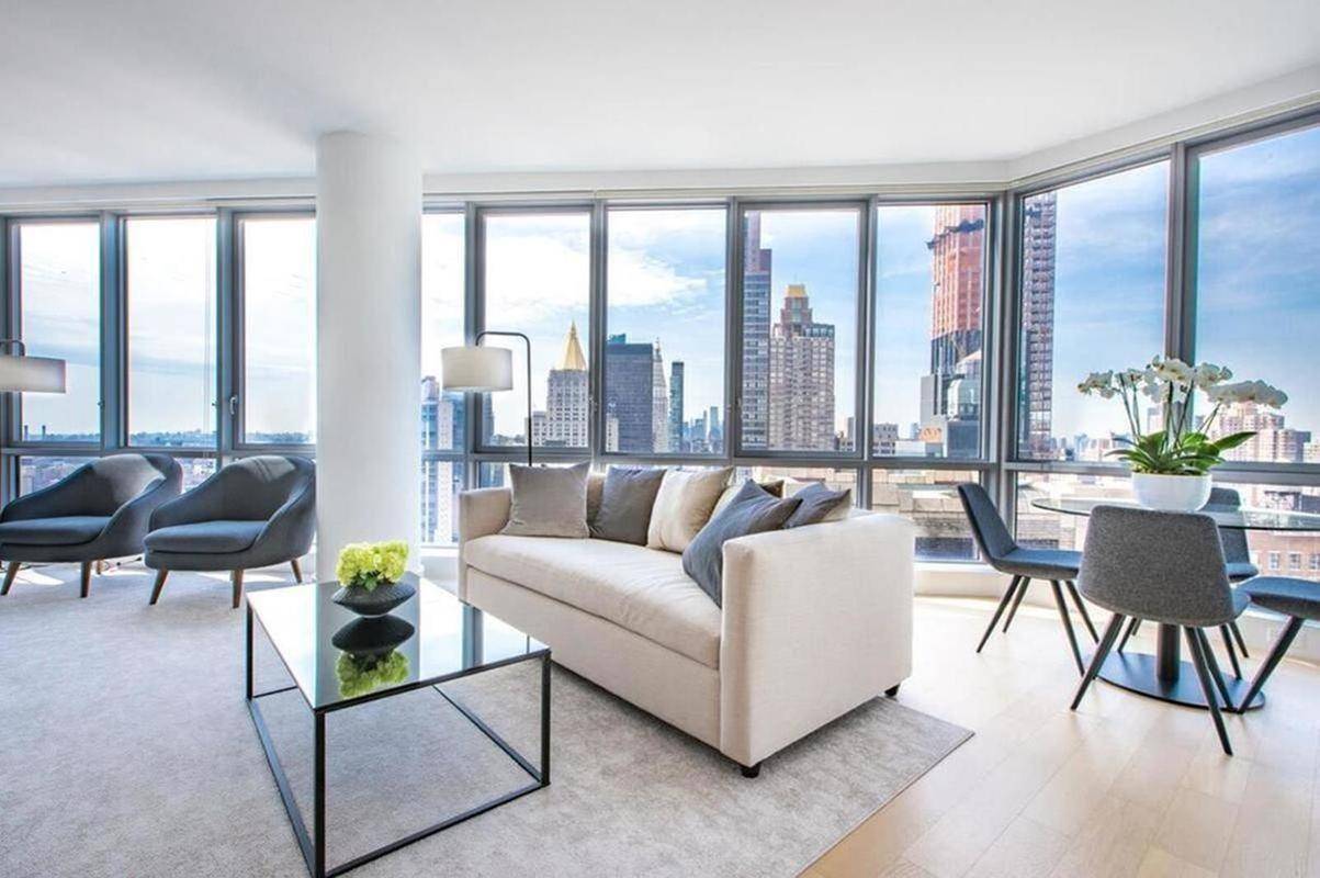 Amazing 1BR/1.5Bath on High Floor with Breathtaking Views of NYC. Floor to Ceiling Windows and Washer/Dryer in Unit. No FEE!!!!! Call Agent David Now for a Private Viewing at (646) 243-2958.