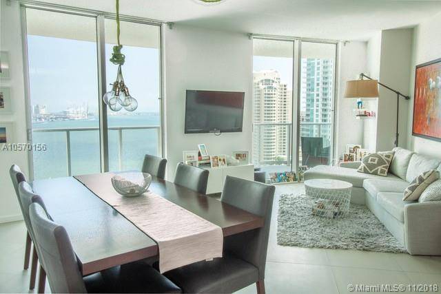 STUNNING UNOBSTRUCTED BAY AND OCEAN VIEWS THROUGH OUT THIS AMAZING UNIT