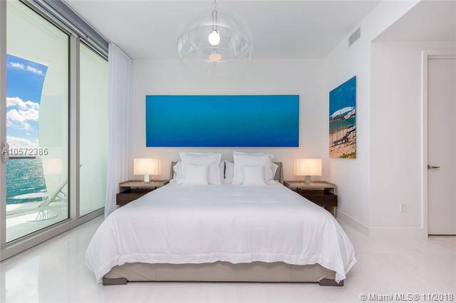 Direct ocean view 2 bedrooms (den converted) & 2 full baths tastefully furnished with top of the line furnishing