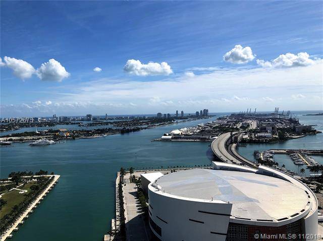 Spectacular 2/2 corner unit at Marina Blue with Flow-Thru floor plan and 2 balconies