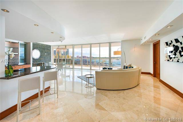Fall in love with this exquisitely upgraded direct bay 2 bedroom + den/office