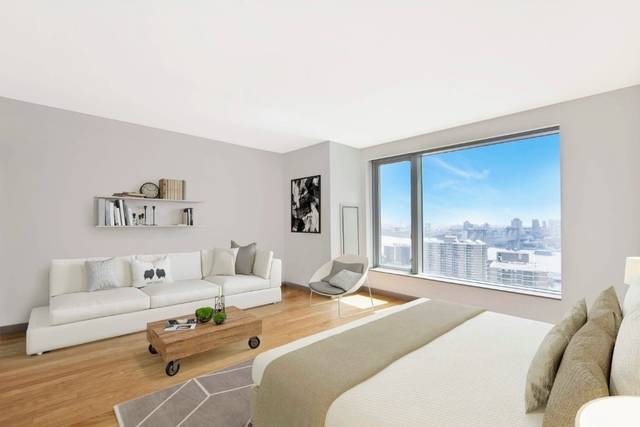 Spacious Studio in FiDi with Laundry in Unit