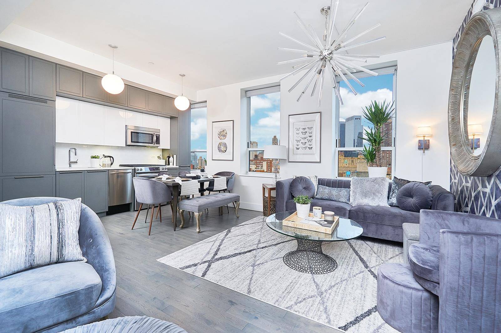 Spacious 1 bedroom 1 bath apartment has a loft like feel with high ceilings, gray stained oak floors, open style kitchen with custom cabinetry and expansive living spaces.