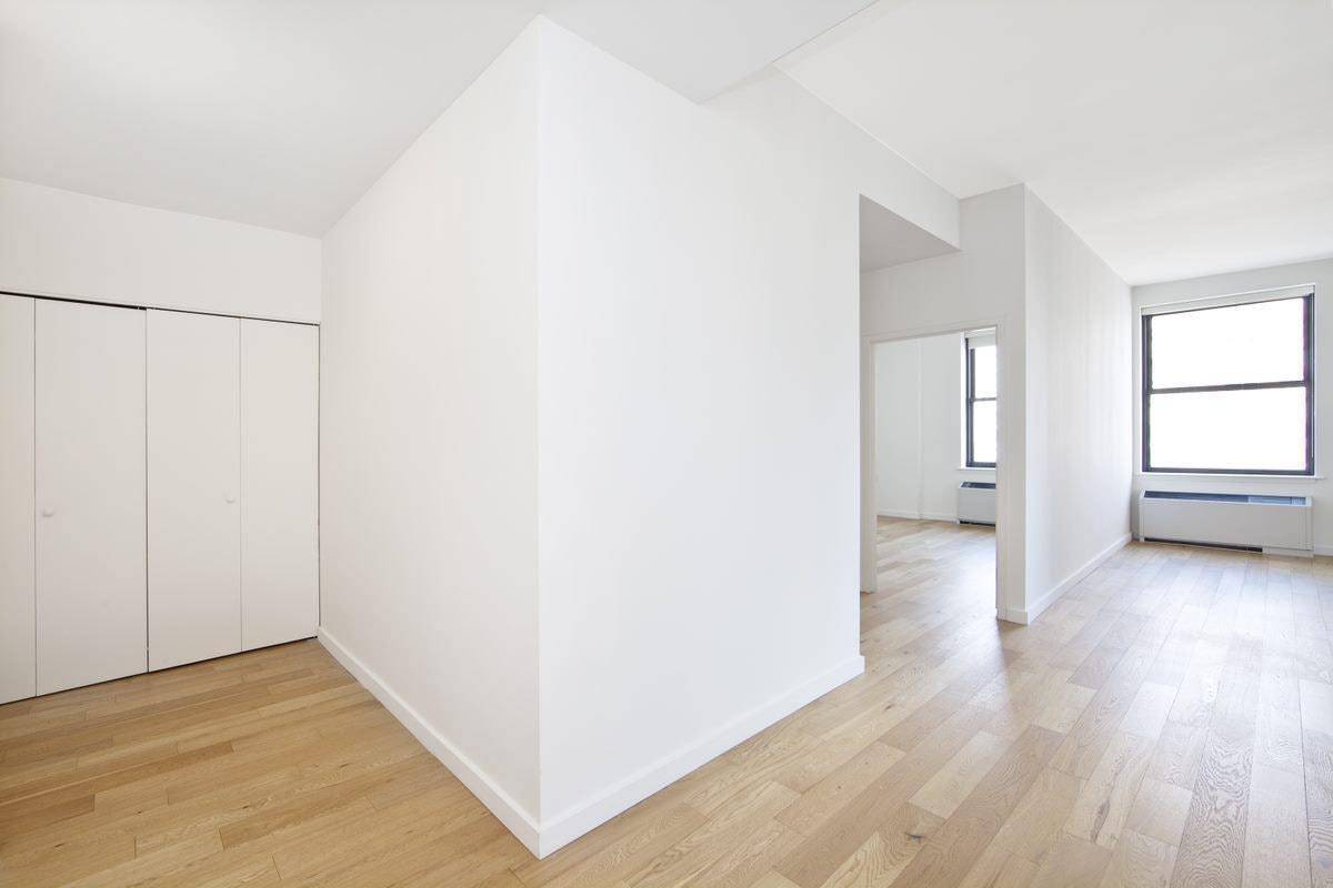 Massive, Sunny, Gut Renovated 2 Bed/2 Bath in FiDi with City & Water Views  .