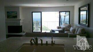 All you need is a bathing suit to move into this beautifully furnished home on the water in Malibu