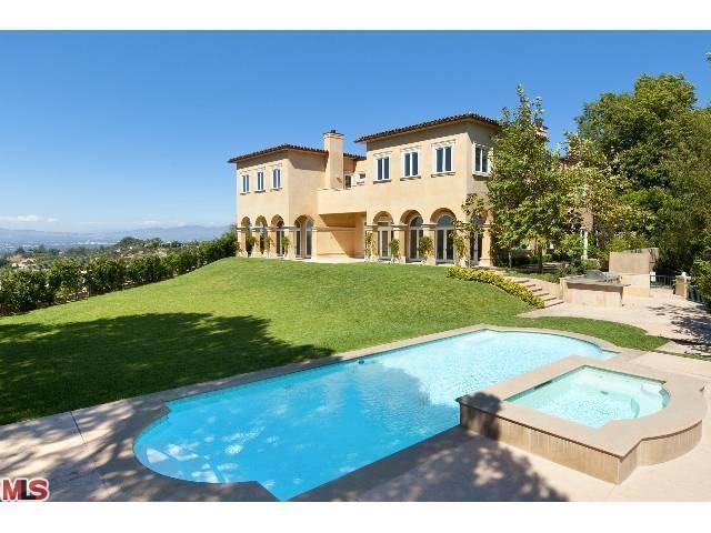 This private newly constructed Mediterranean estate with stunning city