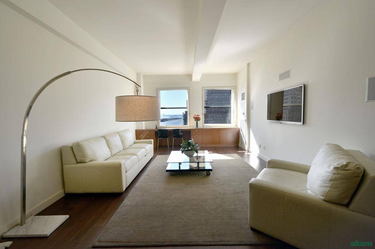 Enjoy NY Harbor views from every room of this sun filled home !