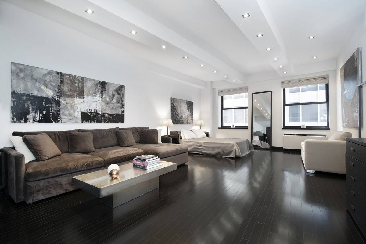 Welcome home to your Massive 888 Square Feet Loft, convertible into One Bedroom should you need a separate bedroom, in the acclaimed Armani Casa designed 20 Pine Street.
