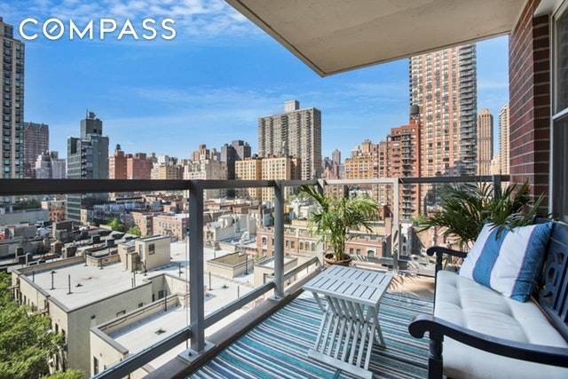 Beautiful high floor converted two bedroom apartment with private balcony and wide open views in the heart of the Upper East Side.
