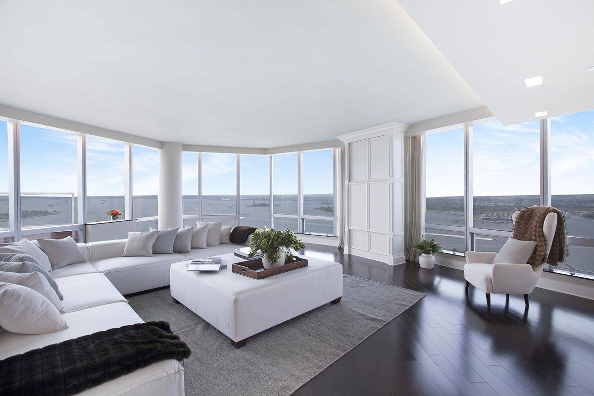 This one of a kind Luxury Duplex Penthouse Residence, located on the top two levels, of the famed Ritz Carlton in Battery Park City, offers all the white glove amenities ...